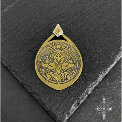 Etched brass and sterling silver pendant made by Nairy (Eliz'art and Manu Menendez)