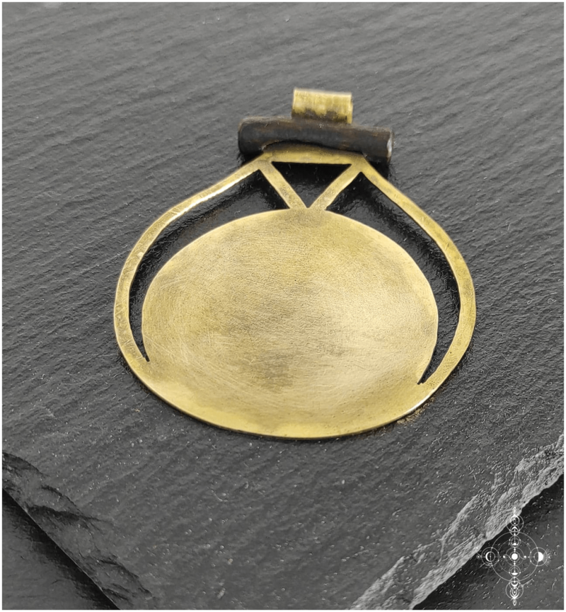 Etched brass and wood pendant made by Nairy (Eliz'art and Manu Menendez)