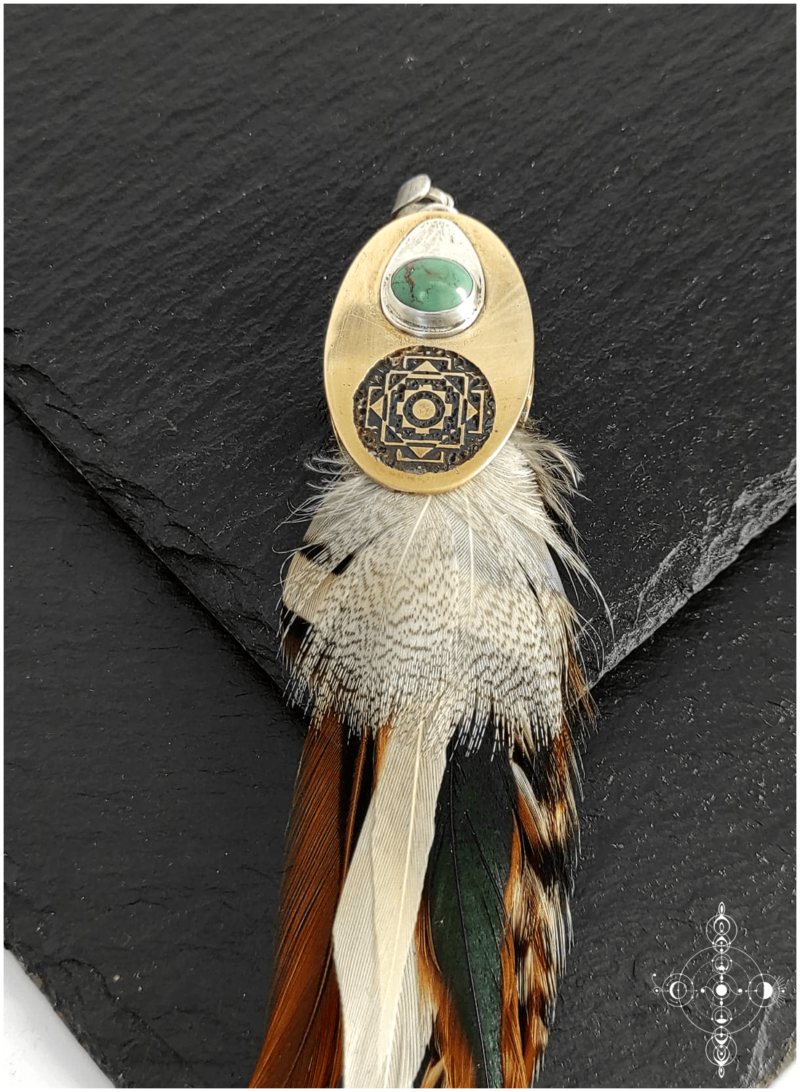 Etched brass, sterling silver pendant with a turquoise and natural feathers made by Nairy (Eliz'art and Manu Menendez)