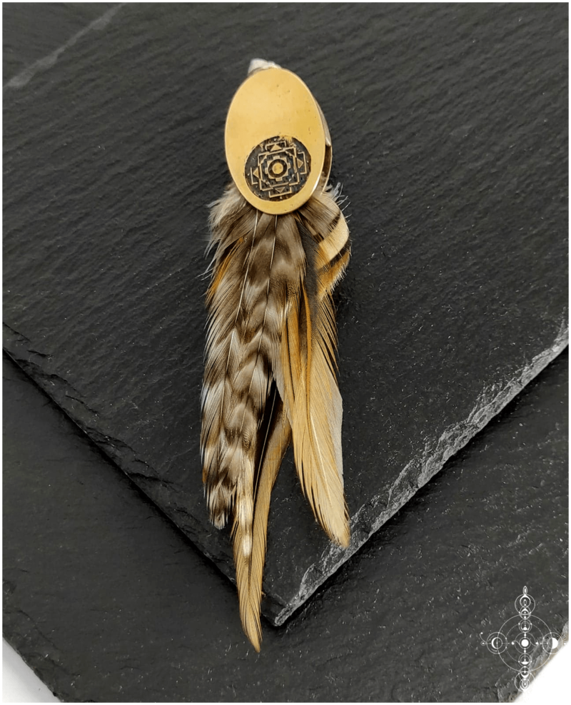 Etched brass, sterling silver pendant with a turquoise and natural feathers made by Nairy (Eliz'art and Manu Menendez)