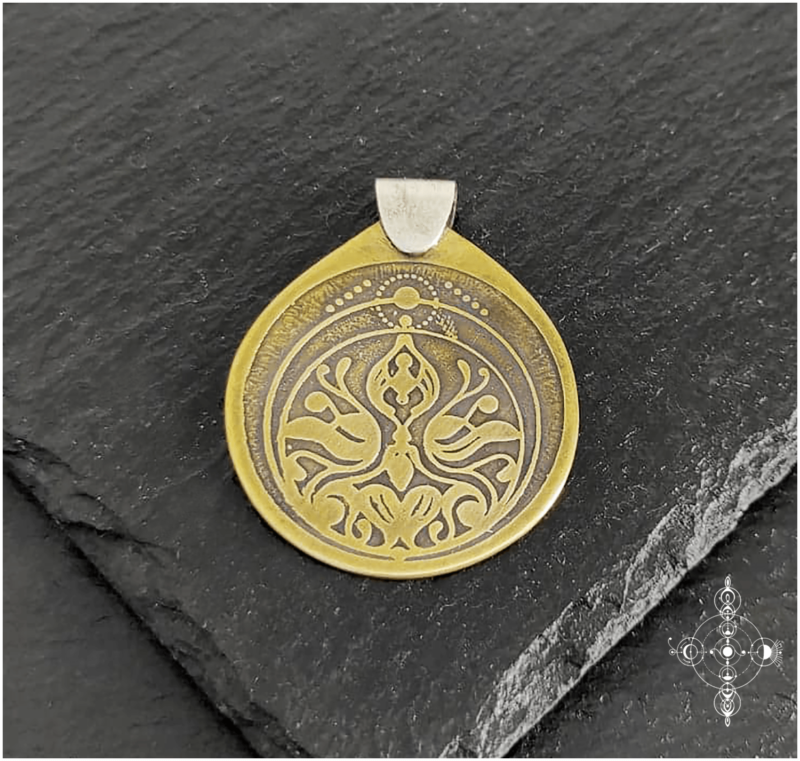 Etched brass and sterling silver pendant made by Nairy (Eliz'art and Manu Menendez)